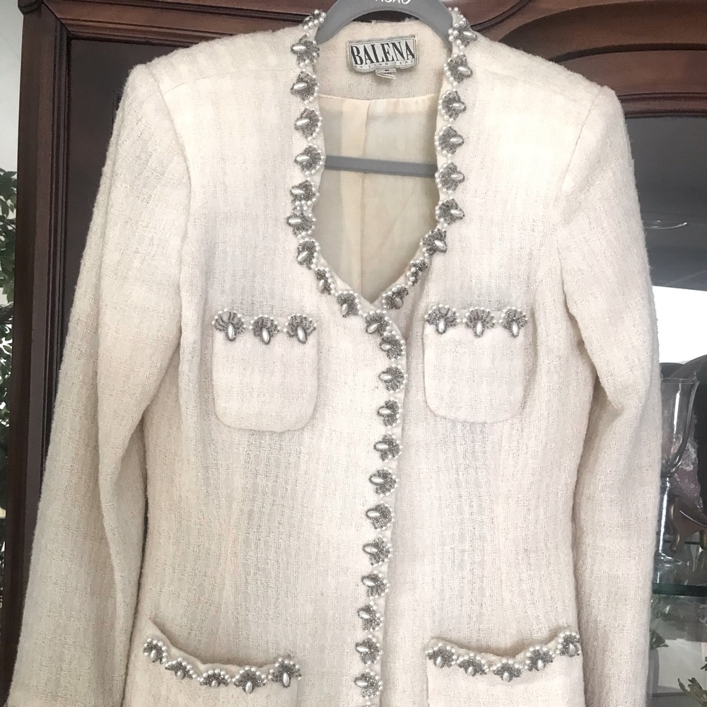 Dressy wool jacket. Slight lining fade. Stunning casual or elegant.